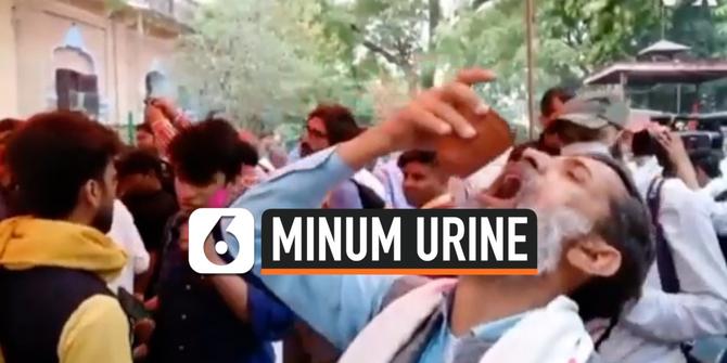 VIDEO: Ratusan Warga India Minum Urine Sapi Demi Cegah Corona
