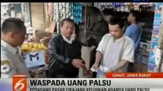 Peredaran uang palsu membuat pedagang di Pasar Cikajang, Garut, mengalami kerugian hingga 1,8 juta per hari.