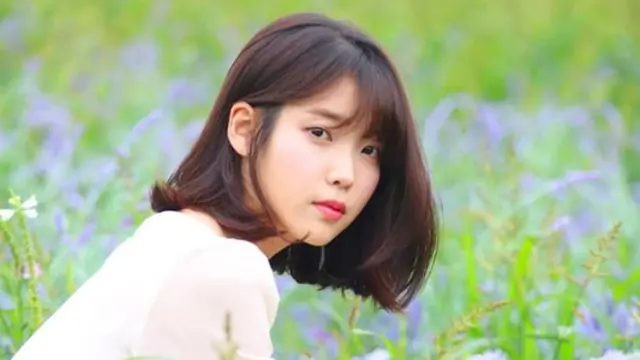 [Bintang] Rahasia Kesuksesan IU di Dunia Hiburan Korea Selatan