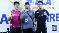 Nunung Wibiyanto (tengah), mantan pemain ganda putra Indonesia yang kini melatih di tim Singapura. (PBSI)
