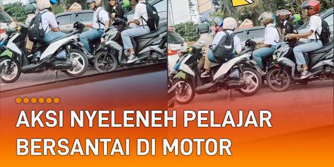 VIDEO: Aksi Nyeleneh Pelajar Bersantai di Motor Saat Tunggu Lampu Merah
