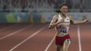 Pelari Indonesia, Ulfa Silviana, saat tampil pada Invitation Tournament Asian Games 2018 cabang atletik nomor 200 m di SUGBK, Jakarta, Selasa (13/2/2018). Meski kalah dirinya memecahkan rekor pribadi dengan 24,86 detik. (Bola.com/Vitalis Yogi Trisna)