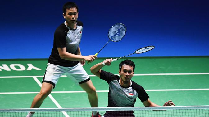 Ganda putra Hendra Setiawan / Mohammad Ahsan. (AFP Photo/Charly Triballeau)