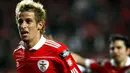 Selebrasi gol dari gelandang Benfica, Fabio Coentrao, ke gawang Maritimo dalam lanjutan Primeira Liga di Luz Stadium, Lisbon, 27 Februari 2011. AFP PHOTO / PATRICIA DE MELO MOREIRA
