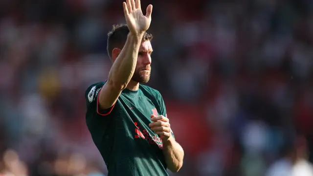 James Milner meninggalkan Liverpool.