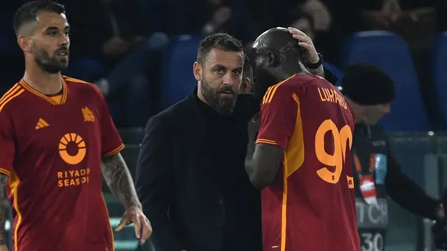 Daniele De Rossi dan Romelu Lukaku