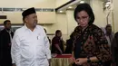 Wakil Ketua DPR Fahri Hamzah bersama Menteri Keuangan Sri Mulyani saat menghadiri Seminar Nasional Nota Keuangan RAPBN 2020 : Mengawal Akuntabilitas Penerimaan Negara di Kompleks Parlemen MPR/DPR-DPD, Senayan, Jakarta, Rabu (21/8/2019). (Liputan6.com/Johan Tallo)