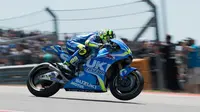 Bos Suzuki, Davide Brivio, berjanji segera menemukan formula untuk membuat Andrea Iannone nyaman dengan motor GSX-RR. (AFP/Getty Images)