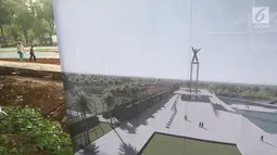 Spanduk proyek revitalisasi yang dipampang di Lapangan Banteng di Jakarta Pusat, Rabu (1/11). Tiga segmen tersebut yakni revitalisasi taman dan patung, pagar, serta revitalisasi lapangan olahraga. (Liputan6.com/Immanuel Antonius)
