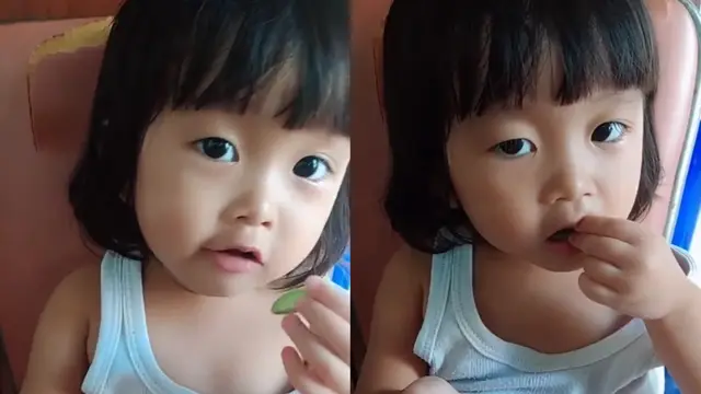 Bocah kecil makan petai layaknya camilan