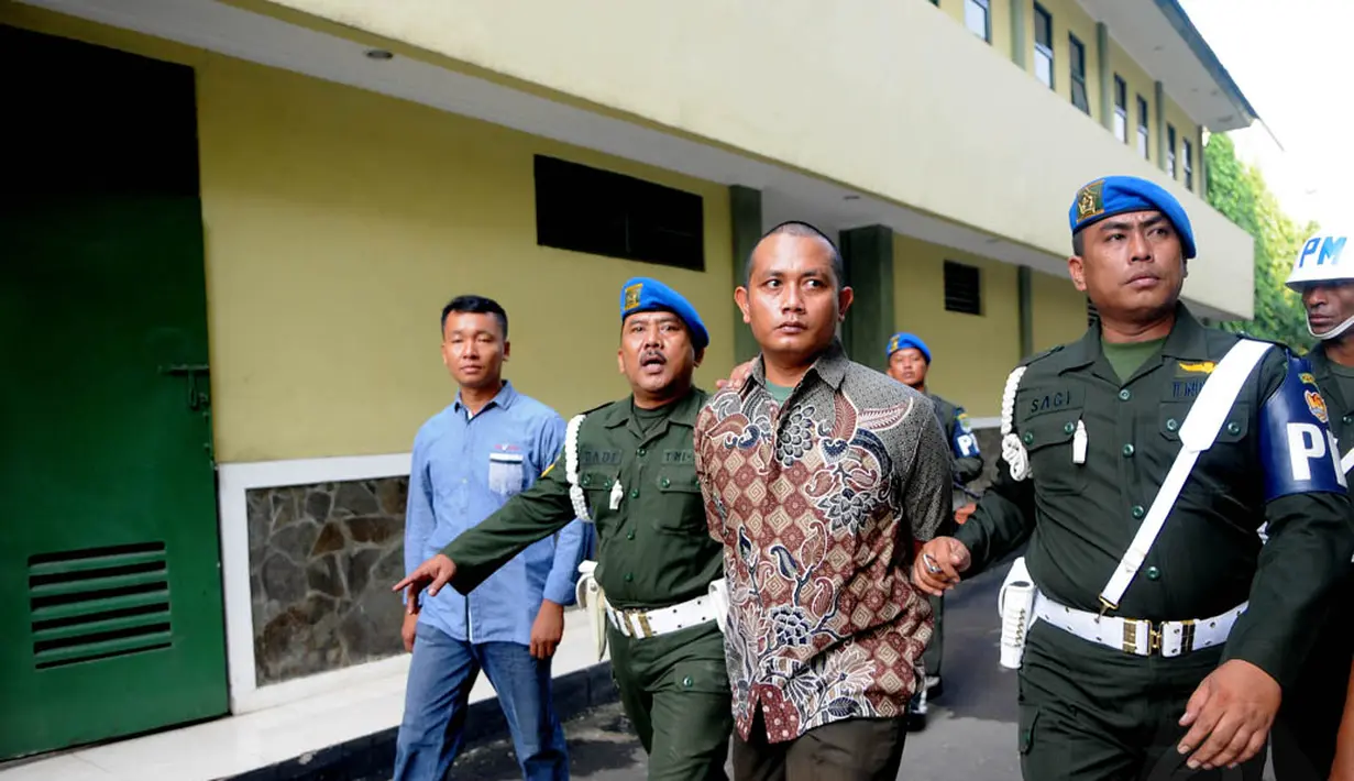 Tak hanya dipecat dengan tidak hormat dari satuannya, Pratu Heri juga akan diadili di Pengadilan Militer, Jakarta, Senin (7/7/14). (Liputan6.com/Herman Zakharia)