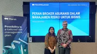 (ki-ka) SVP Business Development Leader Marsh Indonesia Nova Tambunan dan CEO of Marsh McLennan Indonesia Douglas Ure (doc: Liputan6/SulungLahitani)