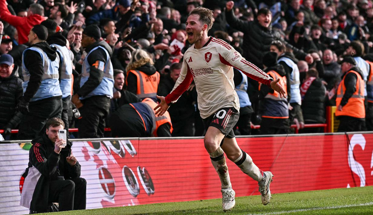 Alexis Mac Allister menjadi pencetak gol kemenangan Liverpool atas Nottingham Forest dalam laga lanjutan Liga Inggris 2025/2026 pada Minggu (22/02/2026). (AFP/Ben Stansall)