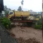 Hujan deras yang melanda Kabupaten Karo, Sumut, mengakibatkan terjadinya aliran lahar dingin Gunung Sinabung. (Liputan6.com/Reza Efendi)