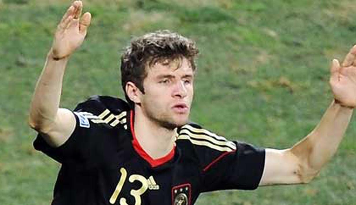 Selebrasi gol striker Jerman Thomas Mueller di laga perebutan tempat ketiga PD 2010 melawan Uruguay di Nelson Mandela Bay Stadium, Port Elizabeth, 10 Juli 2010. Jerman unggul 3-2. AFP PHOTO / CARL DE SOUZA 