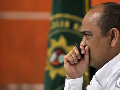 Gulat Manurung saat menjalani sidang lanjutan di Pengadilan Tipikor,   Jakarta, Senin (5/1/2015). (Liputan6.com/Miftahul Hayat)
