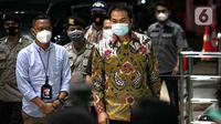 Wakil Ketua DPR RI Azis Syamsuddin tiba di Gedung KPK, Jakarta, Jumat (24/9/2021). Kehadiran Azis untuk menjalani pemeriksaan pertama terkait kasus dugaan suap penanganan perkara di Kabupaten Lampung Tengah. (Liputan6.com/Faizal Fanani)