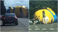 Minion raksasa yang menggelinding di sebuah jalan di Dublin, Inggris. (Mirror.co.uk)