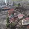 Foto yang diambil dari pesawat tanpa awak (drone) menunjukkan kerusakan di sebuah desa yang terkena dampak banjir bandang di Agam, Sumatera Barat, Indonesia, Selasa, 14 Mei 2024. (AP Photo/Sutan Malik Kayo)
