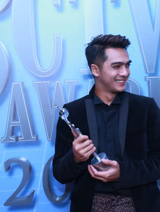 Sempat tidak percaya bisa memenangkan penghargaan ini lagi lantaran saingan lain yang dianggapnya sangat berat. Ia merasa semua aktor yang masuk nominasi berpeluang menjadi juara. (Adrian Putra/Bintang.com)