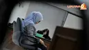 Chairunnisa hanya bisa tertunduk dan menitikkan air mata saat mendengar vonis dari  Majelis Hakim (Liputan6.com/Johan Tallo)