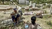 Suasana pemakaman di Madagaskar Timur usai terjadi Topan Batsirai. (AFP/Laure Verneau)