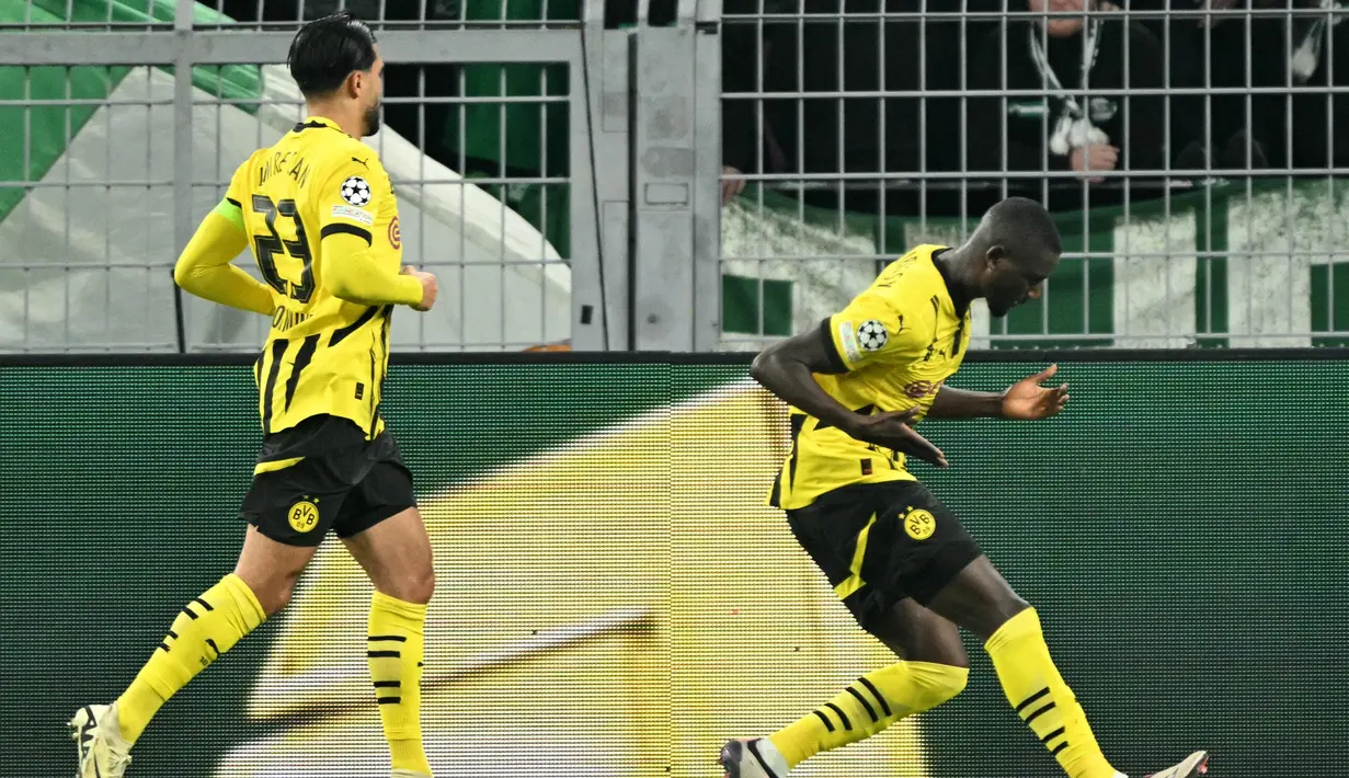 Dua gol Serhou Guirassy pada menit ke-40 (P) dan 66 semakin memperlebar keunggulan Borussia Dortmund. (INA FASSBENDER/AFP)