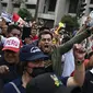 Aksi protes oleh para pendukung mantan Presiden Peru Pedro Castillo. (Dok. AFP)