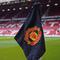 Bendera sepak pojok berlogo Manchester United di Old Trafford. (c) AP Photo/Dave Thompson