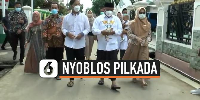 VIDEO: Nyoblos di TPS, Calon Bupati Karawang Bawa Ayam Putih