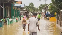 Ilustrasi banjir. (Photo by Misbahul Aulia on Unsplash)