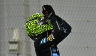 Pembalap McLaren’s, Lando Norris, merayakan gelar juara dunia F1 2025 di Grand Prix Abu Dhabi di Sirkuit Yas Marina, Abu Dhabi, Minggu (7/12/2025). (Andrej Isakovic/AFP)