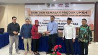 PT PAMA menyerahkan bantuan kemasan produk kepada para pelaku UMKM yang menjadi binaannya.