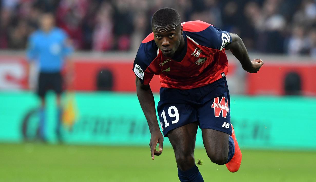 4. Nicolas Pepe  (Lille) - Mendengar rumor ketertarikan Manchester United, Lille sebagai klub pemilik Nicolas Pepe sudah siap melepasnya dengan banderol 80 juta euro yang dirasa bisa dipenuhi Red Devils. (Photo by Denis Charlet / AFP)