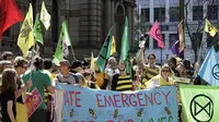 Demo aktivis lingkungan di Sydney, Australia.(Source: AP/ Rick Rycroft)