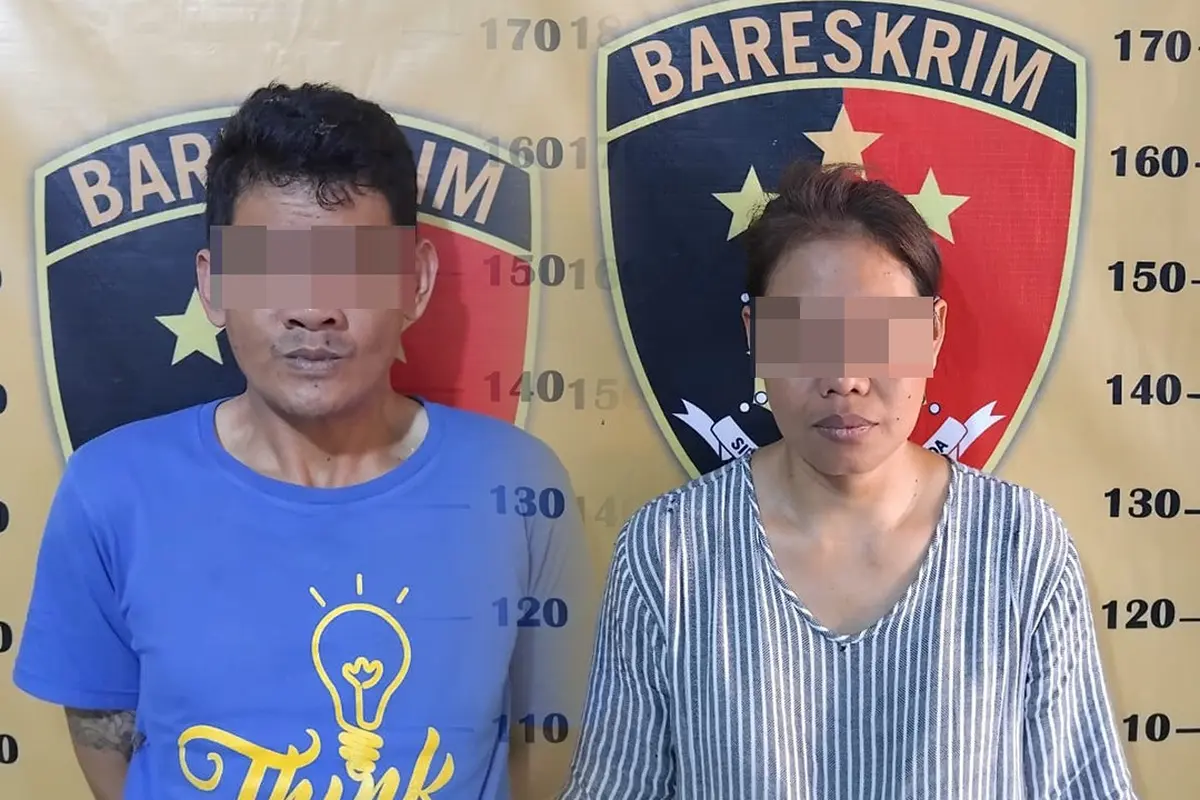 Pasangan suami istri EY dan DS diamankan di Mapolsek Teluk Betung Selatan. Foto : (Dokumen mapolsek )