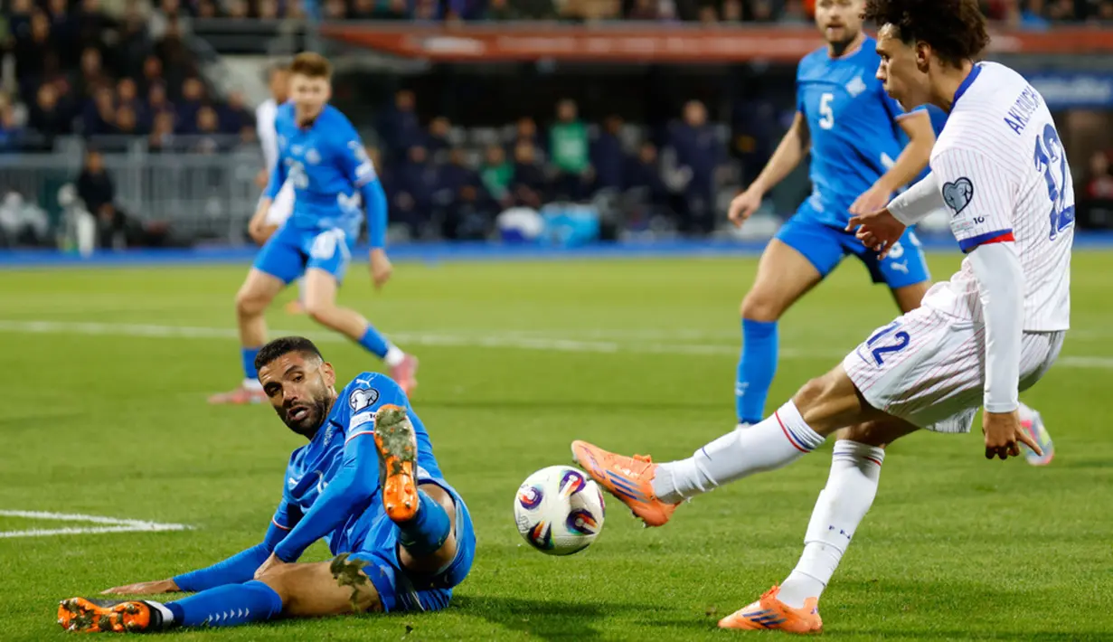Hasil ini tak mengubah posisi Prancis di klasemen Grup D. Les Bleus masih kokoh bertengger di puncak klasemen dengan poin 10 dari empat laga yang sudah dilakoni. (AP Photo/Brynjar Gunnarsson)