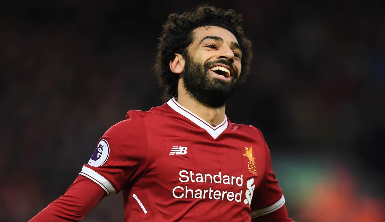 1. Mohamed Salah (Liverpool) - 9 Gol. (AFP/Paul Ellis)