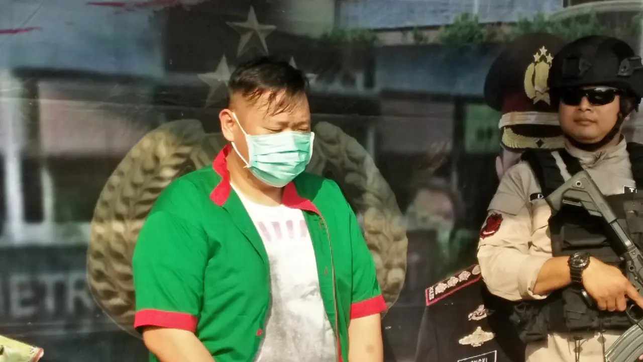 Reza Bukan saat dirilis polisi
