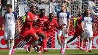 Pemain Timnas Kanada, Cyle Larin, merayakan gol yang dicetaknya ke gawang Bosnia-Herzegovina dalam laga pertama Grup B Piala Dunia 2026 di Toronto, Sabtu (13/6/2026) dini hari WIB. (AP Photo/Stephanie Scarbrough)