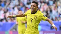 Winger andalan Timnas Malaysia, Faisal Halim membobol gawang Timnas Korea Selatan di Piala Asia 2023. (AFP/Hector Retamal)