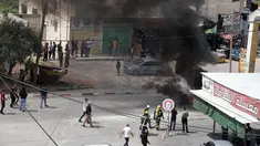 Asap mengepul selama bentrokan antara warga Palestina dan pasukan Israel di kota Jenin di Tepi Barat pada 13 Mei 2022. Israel memperkuat pasukan keamanan di Yerusalem menjelang pemakaman veteran jurnalis Al Jazeera Shireen Abu Akleh, dua hari setelah dia terbunuh dalam serangan tentara Israel. (AFP/JAAFAR ASHTIYEH)
