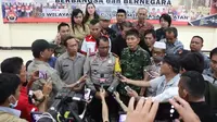Polres Minahasa Selatan menggelar diskusi grup terbuka bersama masyarakat, dan segenap stake holders, sepetti TNI, pemerintah kabupaten, dan tokoh masyarakat, terkait kontra radikalisasi.  (Liputan6.com/Radityo Priyasmoro)