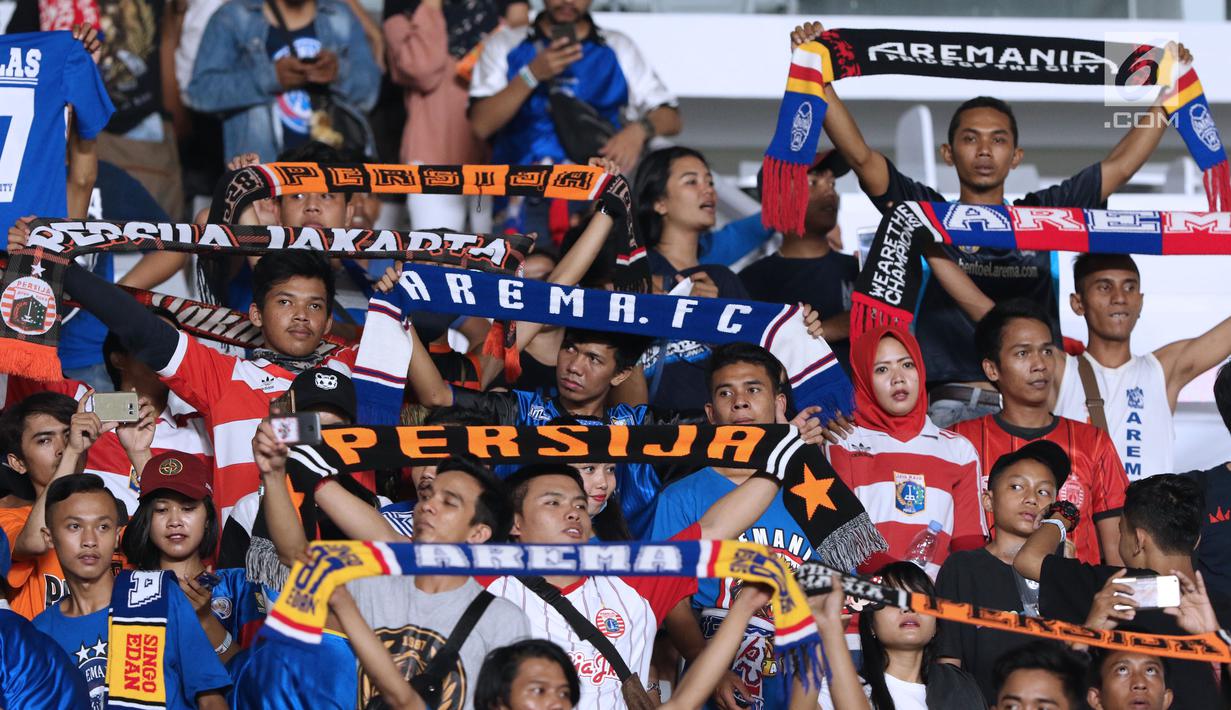 FOTO Raut Wajah Aremania Saksikan Kekalahan Tim Singo Edan Bola