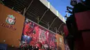 Torehan Liverpool ini sekaligus menyamai Manchester United sebagai tim dengan gelar juara terbanyak di kasta tertinggi Liga Inggris. (Paul ELLIS/AFP)