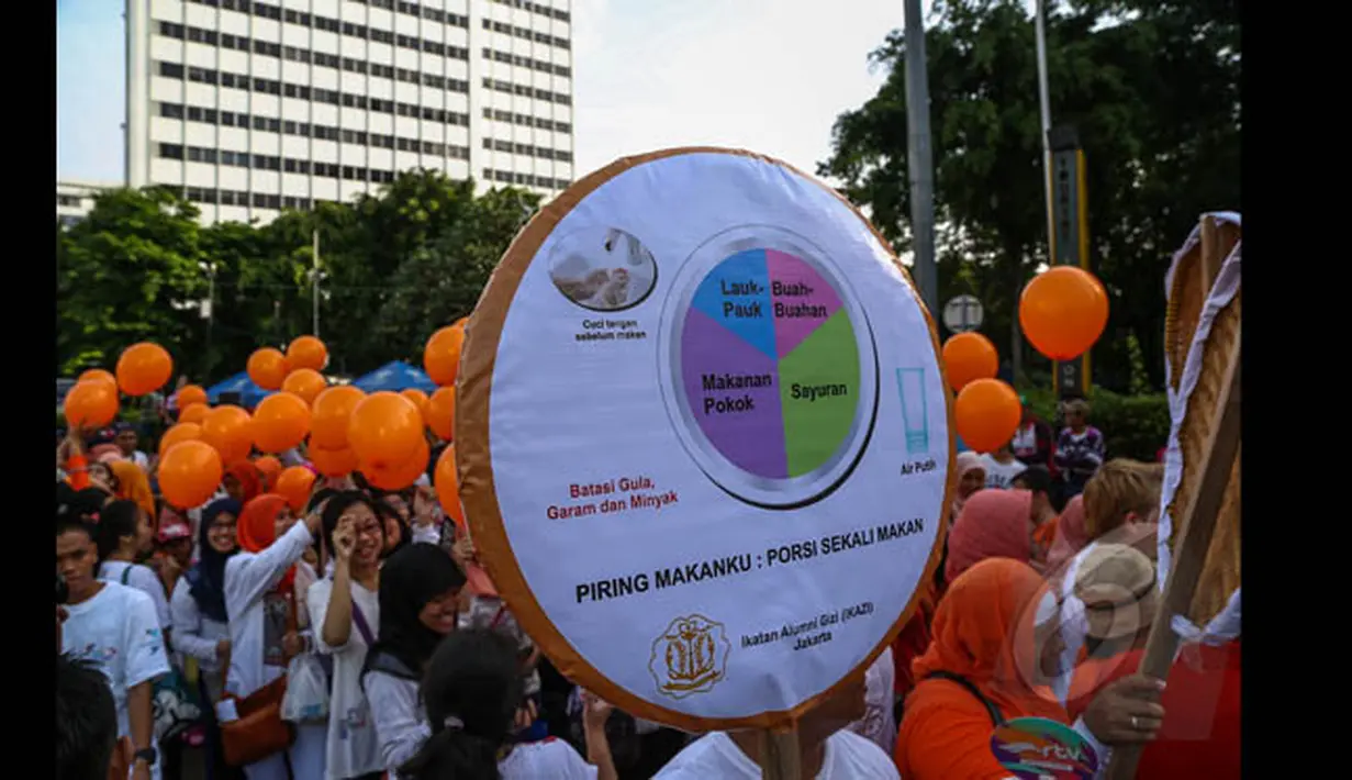 Kegiatan memperingati Hari Gizi Nasional ini diadakan dalam rangka mendukung peningkatan kesadaran dan kepedulian masyarakat akan gizi seimbang dan pola makan sehat, Jakarta, Minggu (25/1/2015). (Liputan6.com/Faizal Fanani)