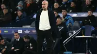 Manajer Spanyol Manchester City, Pep Guardiola, bereaksi selama pertandingan Liga Champions UEFA antara Manchester City dan Club Brugge di Stadion Etihad di Manchester, Inggris barat laut,&nbsp;Kamis dini hari WIB (30-1-2025). (Paul ELLIS/AFP)