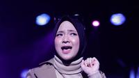Nissa Sabyan saat bernyanyi menghibur penonton di Malaysia Sabtu (12/1/2019) kemarin. (dok. Instagram @sabyan_gambus/https://www.instagram.com/p/Bsikw0AFmJG/Esther Novita Inochi)