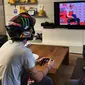 Pembalap Pramac Racing, Pecco Bagnaia berlatih game MotoGP menuju MotoGP Virtual Race. (Twitter/Pecco Bagnaia)