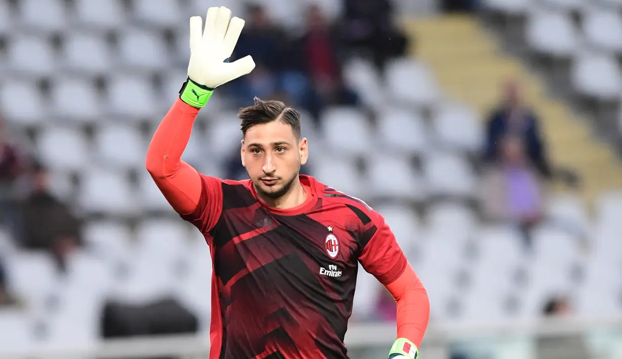 Chelsea sedang mengincar kiper AC Milan, Gianluigi Donnarumma untuk menambah kekuatan lini belakang dalam mengarungi musim 2018-2019 nanti. (AFP/Miguel Medina)